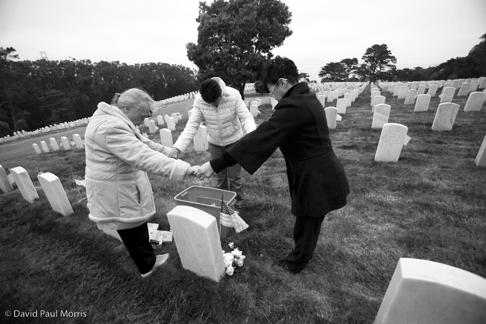 20090523DPM007_memorial.jpg These ladies, who didn't want to be identified, pray as they pay respect to their father and grandfather, Private 24 George Knox of the U.S. Infantry from Colorado who died on May 5, 1933.