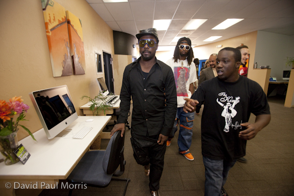 Front man will.i.am with the Black Eyed Peas tours the Art In Action Youth Leadership Program facility