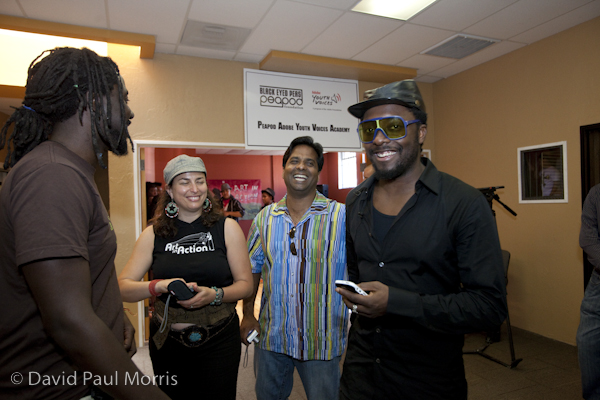 Black Eye Peas front man will.i.am meets performers after touring the Art In Action facility in Oakland, California. 