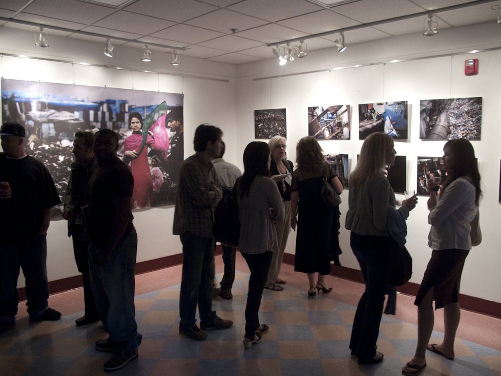 People mingle and check out the show by Dai Sugano at the Exposure Gallery in San Francsico