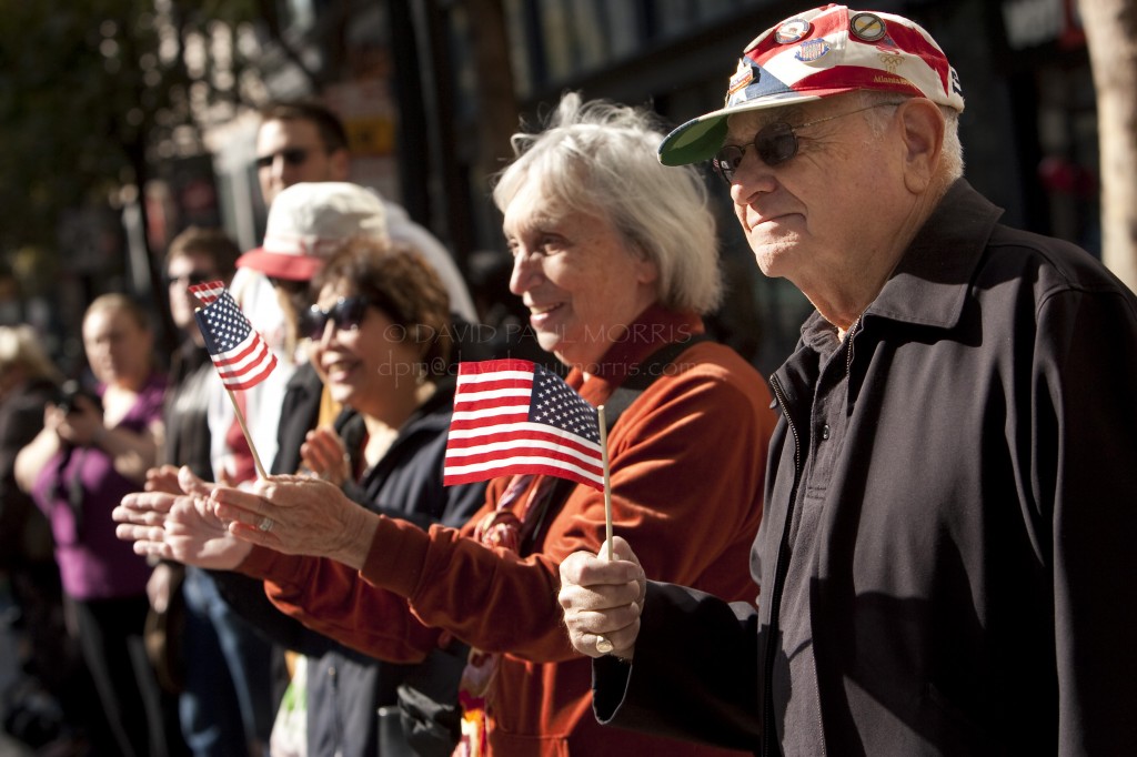 veterans Norton and Charlotte Feldstein watch the Veterans Day Parade along Market Street.